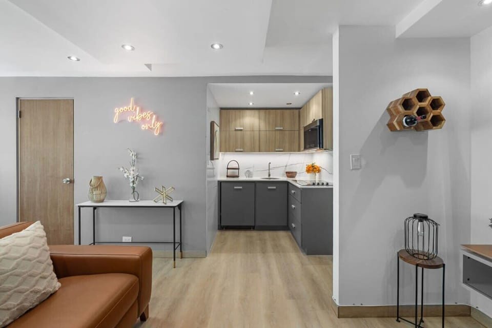 The kitchen is adjacent to the living space. It is a fully equipped kitchen.