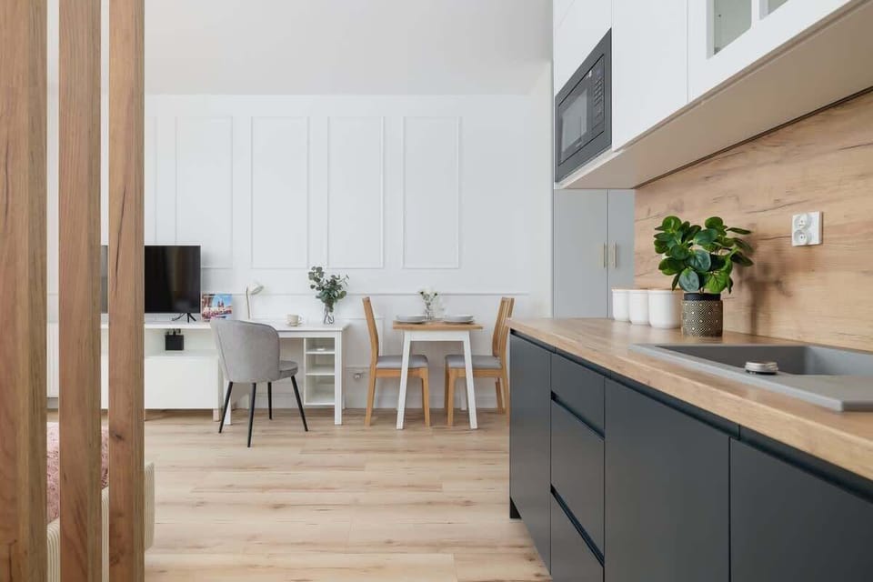 The kitchenette's practical layout maximizes space and functionality.