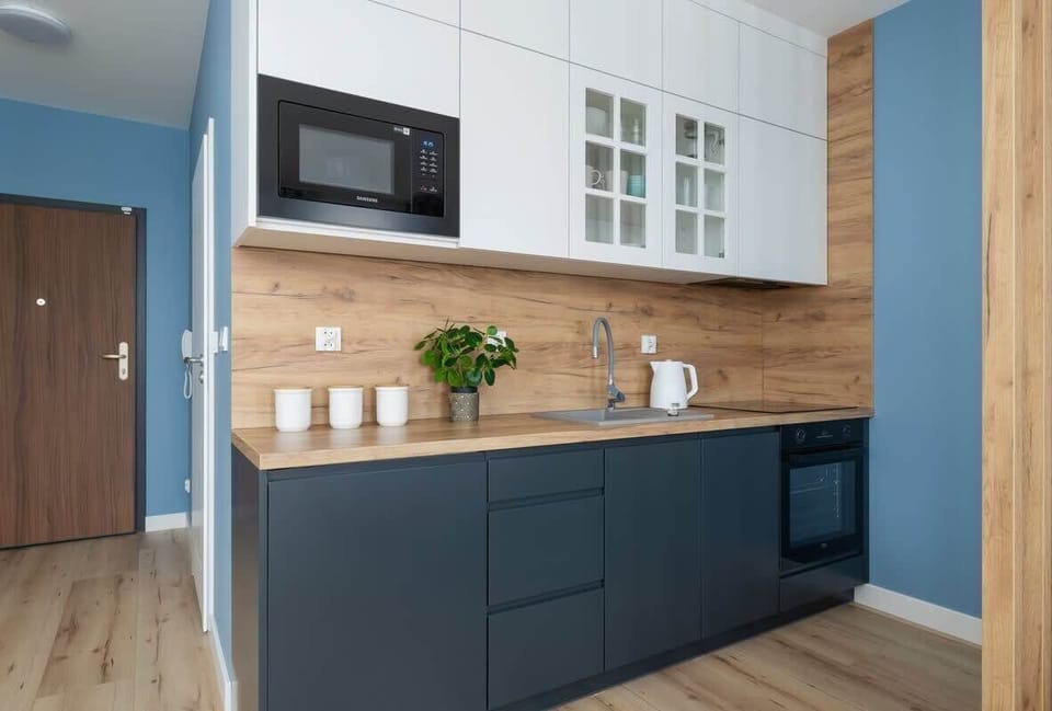 The fully equipped kitchenette includes everything you need for a home-cooked meal.