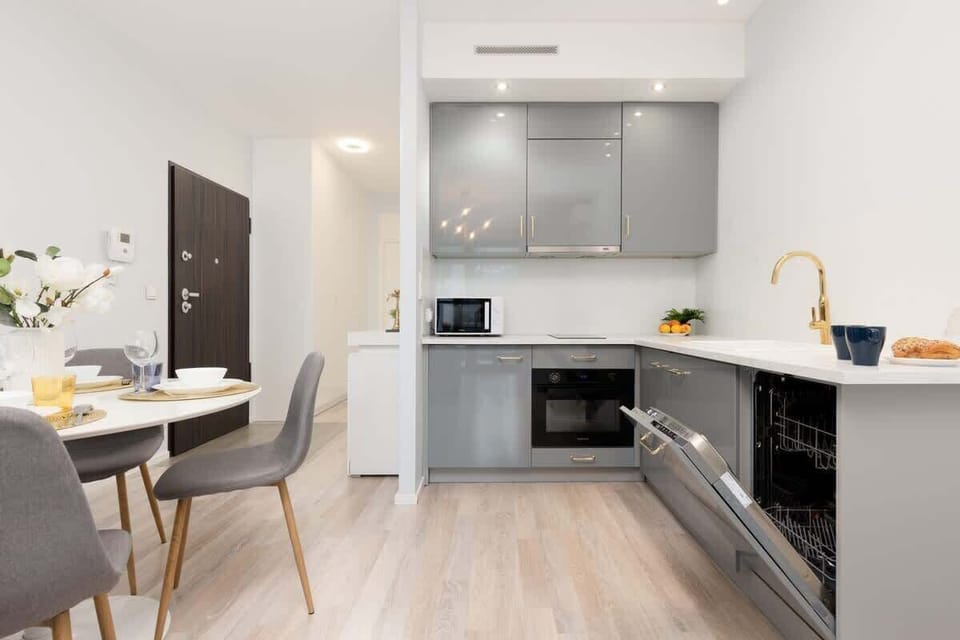 The kitchenette's practical layout maximizes space and functionality.