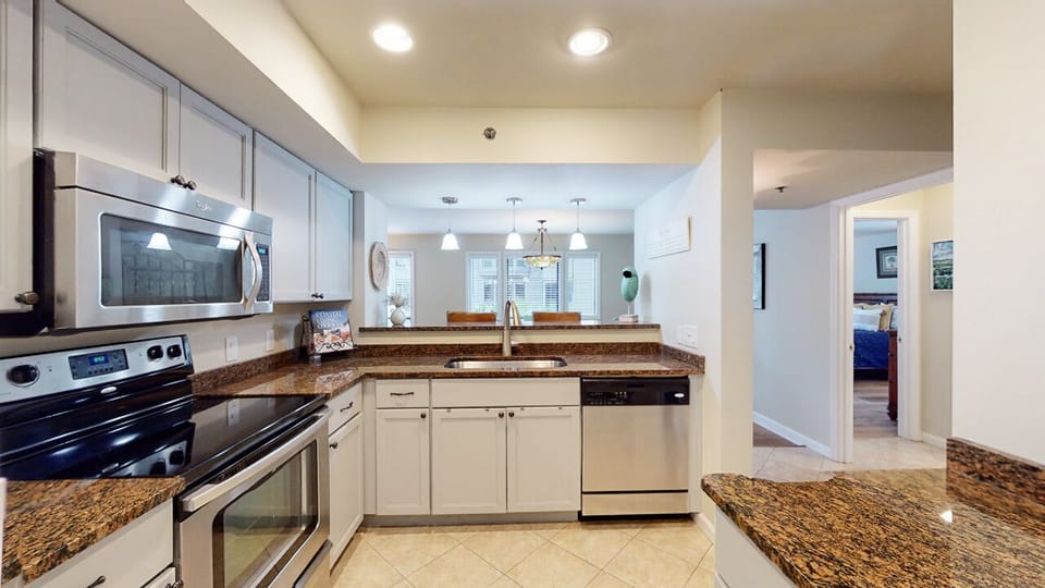 Fully Stocked Kitchen with Granite Countertops