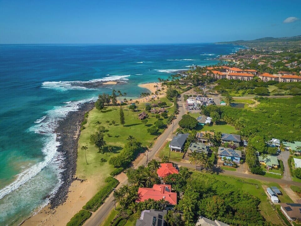 Koali Surfrider Across From Brenneckes and Poipu Beach Park