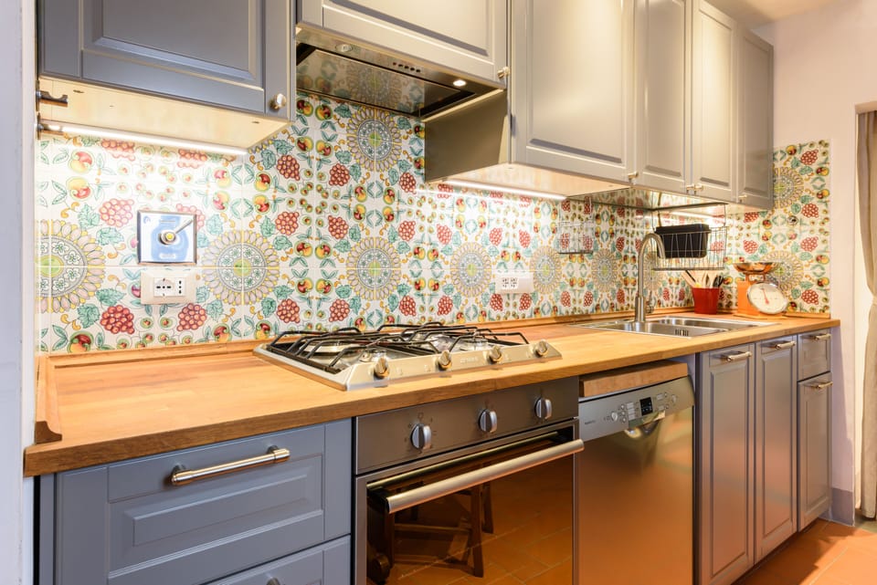 Comfort Apartment | Private kitchen | Full-size fridge, microwave, oven, stovetop