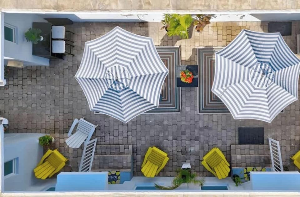 Shared outdoor with courtyard and BBQ area.