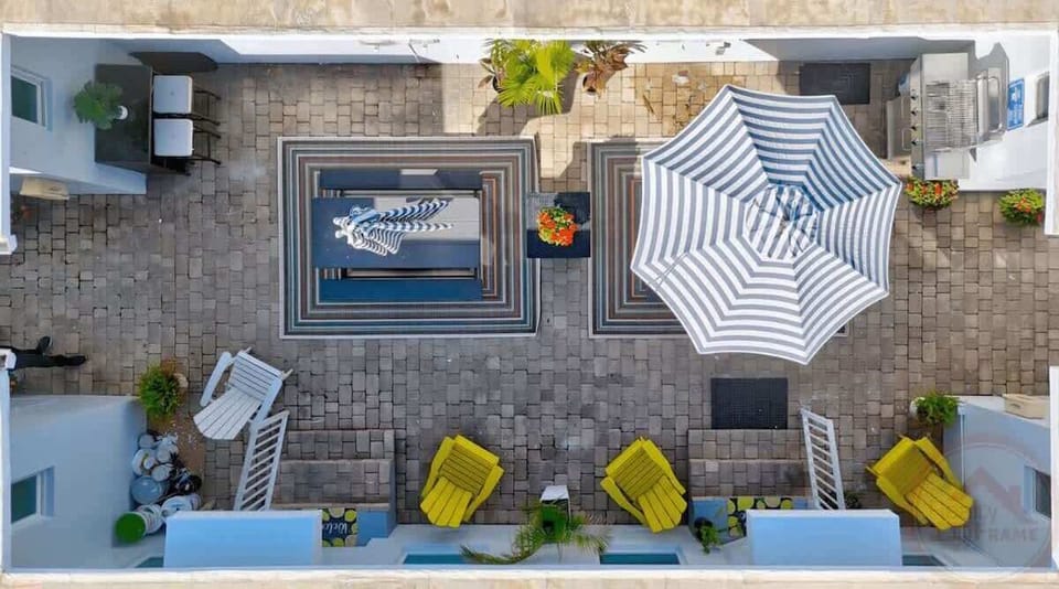 Shared outdoor with courtyard and BBQ area.