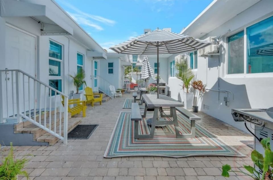 Shared outdoor with courtyard and BBQ area.