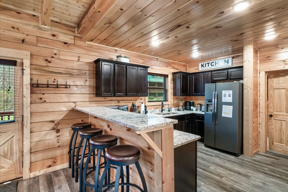 Gather around and share stories over breakfast or drinks at the kitchen bar
