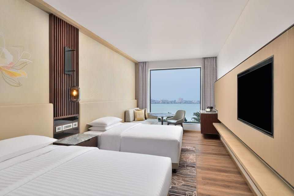 Premium bedding, down comforters, in-room safe, laptop workspace