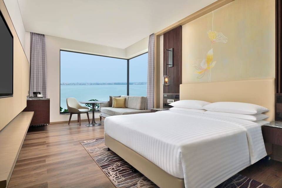 Premium bedding, down comforters, in-room safe, laptop workspace