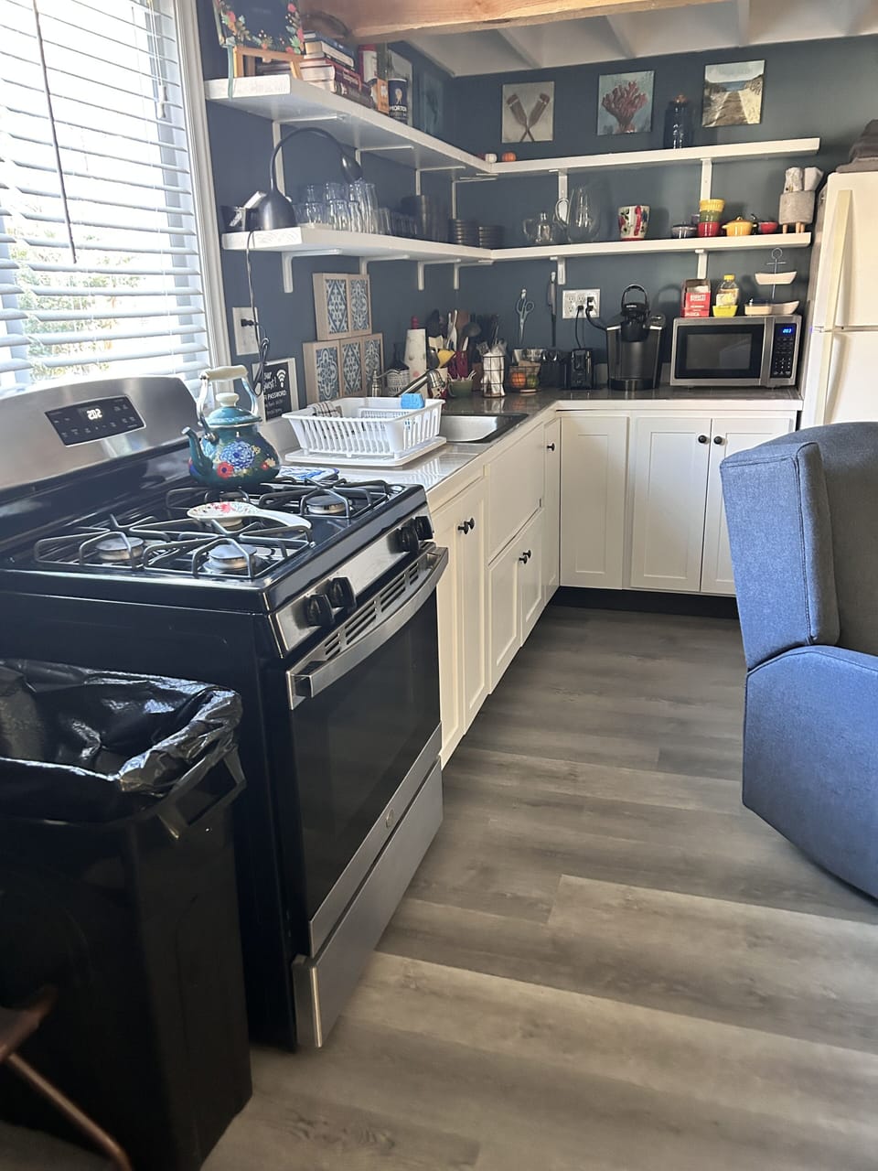 Full kitchen with utensils, pots and pans: basic cooking tools.