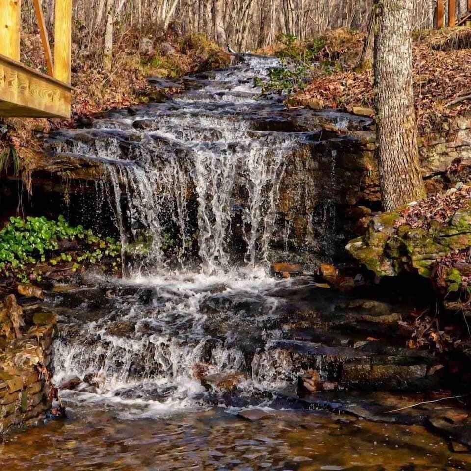 A short walk away, take the trail or walk on the overlook bridge to enjoy views of Blueberry Falls.