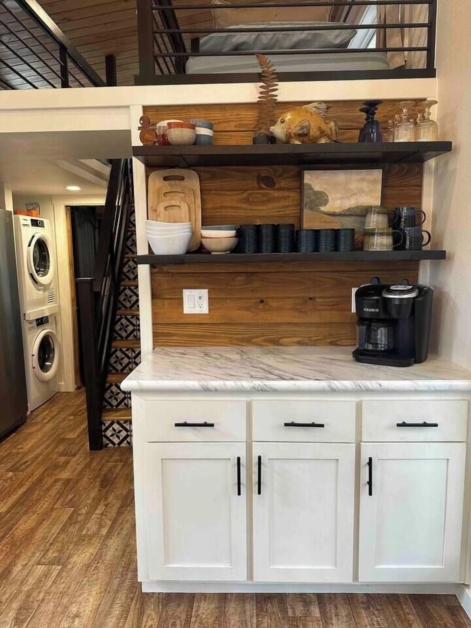 The coffee bar is stocked and ready with both Keurig and drip options—perfect for your morning brew or an afternoon pick-me-up.