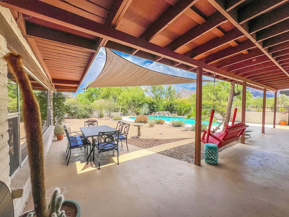 Outdoor seating next to the pool