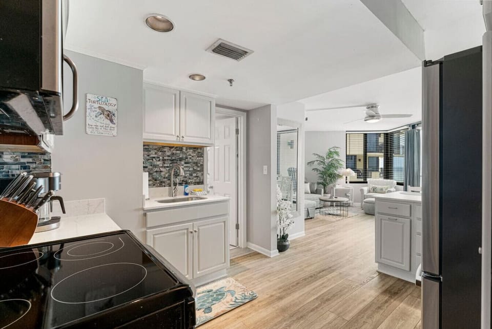 Fully Stocked Kitchen with Ocean Views, Stainless Steel Appliances and Bar Seating