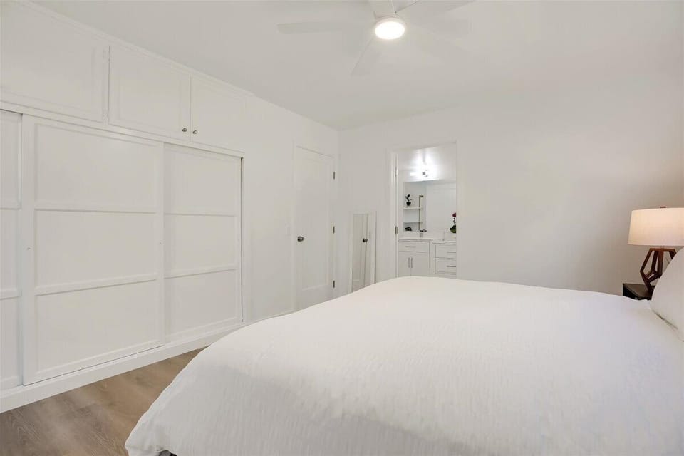 Primary suite with on-suite bathroom completely remodeled and offering privacy.