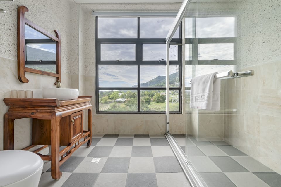 Family Room with Mountain View | Bathroom | Shower, hair dryer, slippers, towels