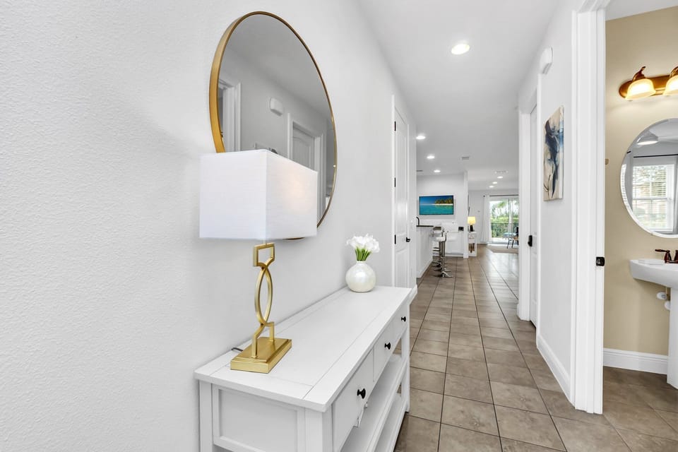 Step inside to a spacious and well-lit foyer, providing a seamless transition from the outdoors to your vacation haven.