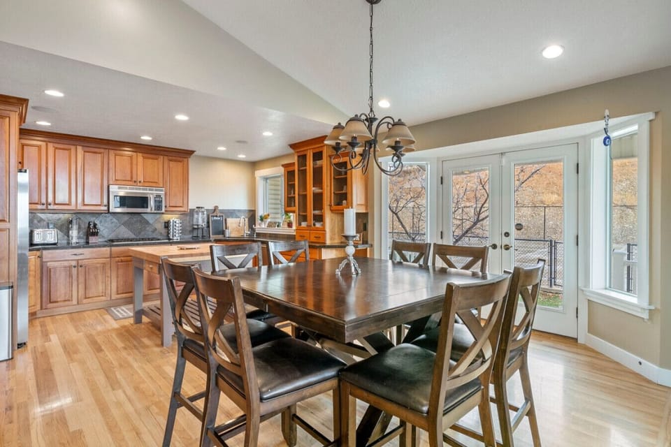 `The perfect gathering spot! 🏡🍷 Enjoy meals with family and friends in this spacious open-concept setting.`