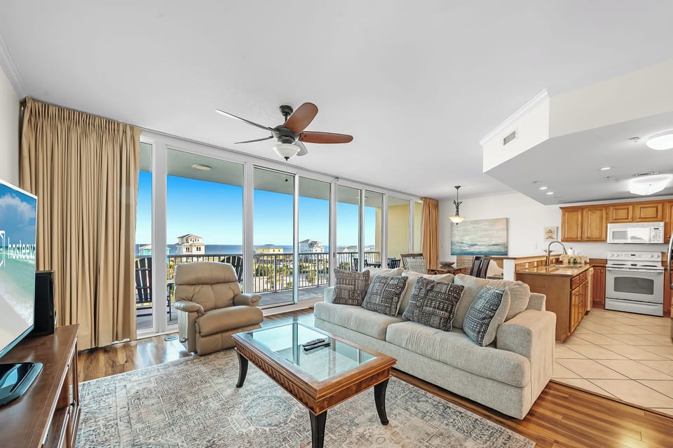 Signature Apartment, 3 Bedrooms, Balcony, Beach View | Living room | 50-inch Smart TV with cable channels