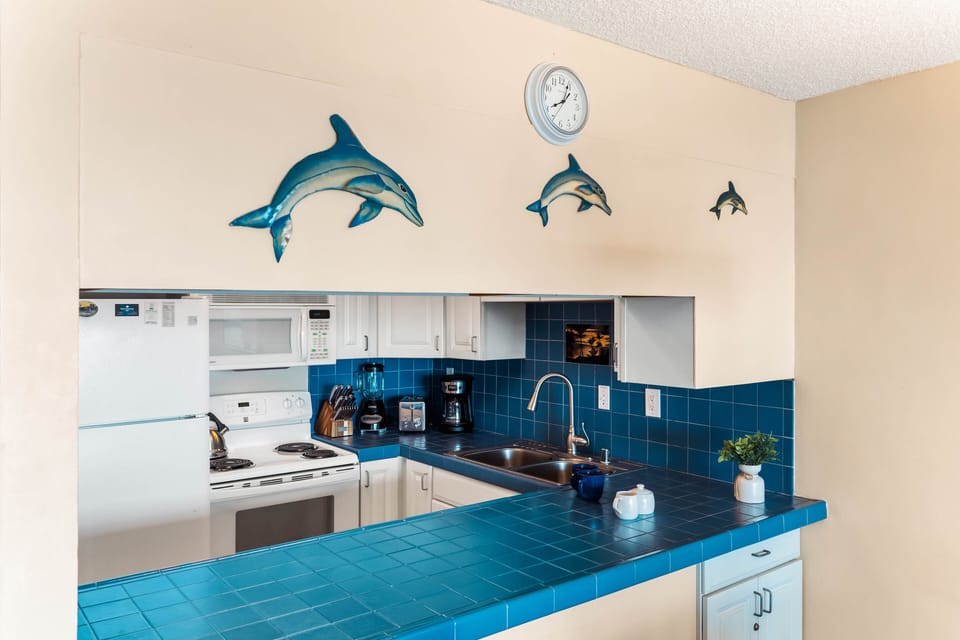 Uniquely blue countertops and backsplash