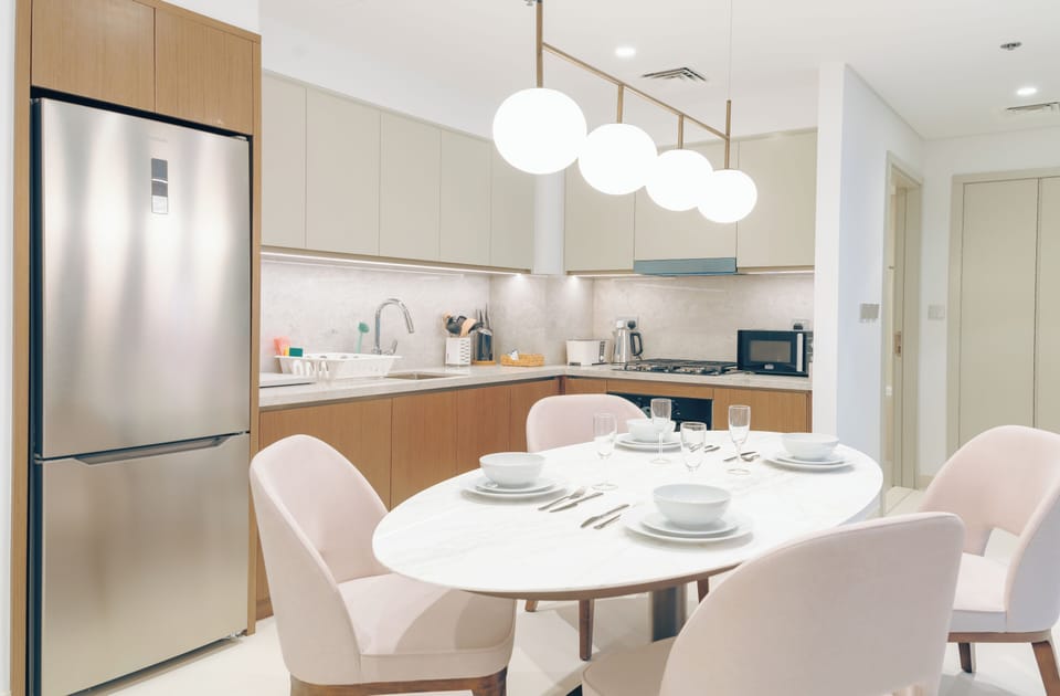 Premium Apartment, 1 King Bed, Balcony, Corner | Private kitchen | Coffee/tea maker, full-size fridge, microwave, oven