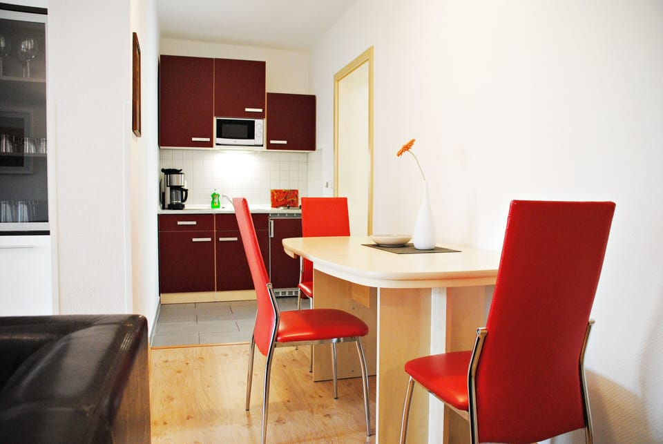 Apartment, 2 Bedrooms | Private kitchen | Fridge, microwave, stovetop, coffee/tea maker
