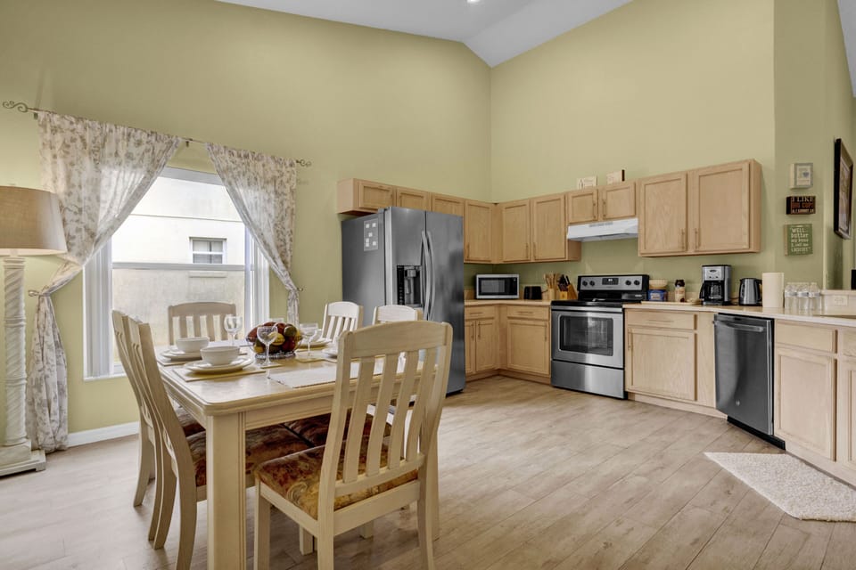 Oversized kitchen with stainless steel appliances