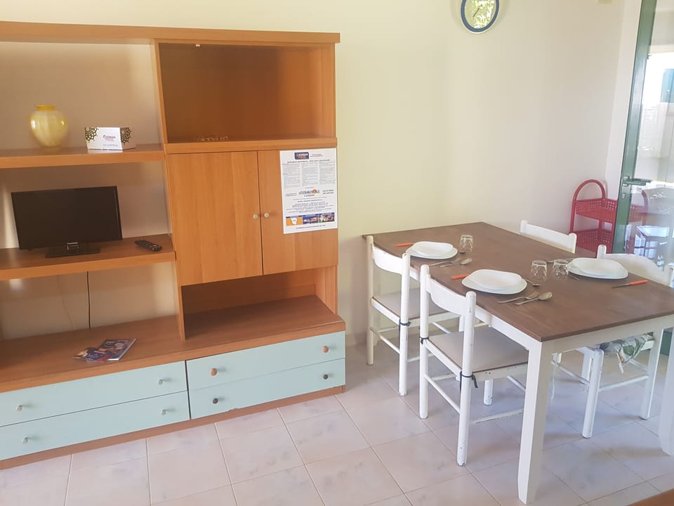 Apartment | Living area | 21-inch flat-screen TV with digital channels