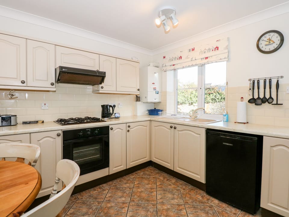 Fridge, electric kettle, toaster, cookware/dishes/utensils