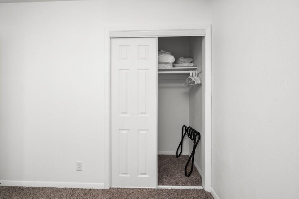 Bedroom one -- Closet space with luggage rack!