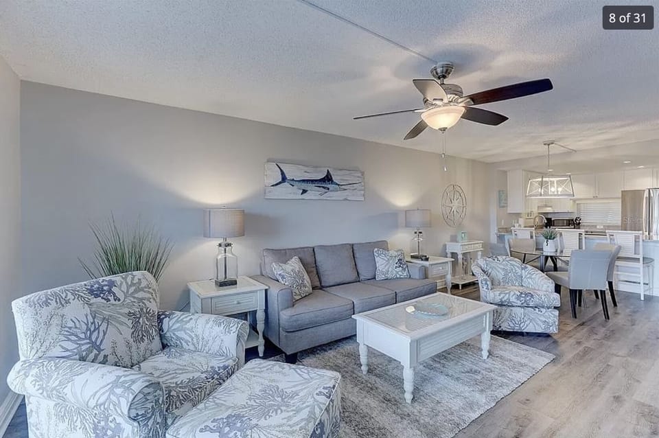 Premier Condo | Living room | 40-inch Smart TV with digital channels, Netflix, Hulu