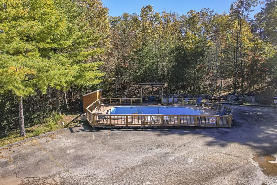 Enjoy sun-drenched serenity by the trees, right from the pool