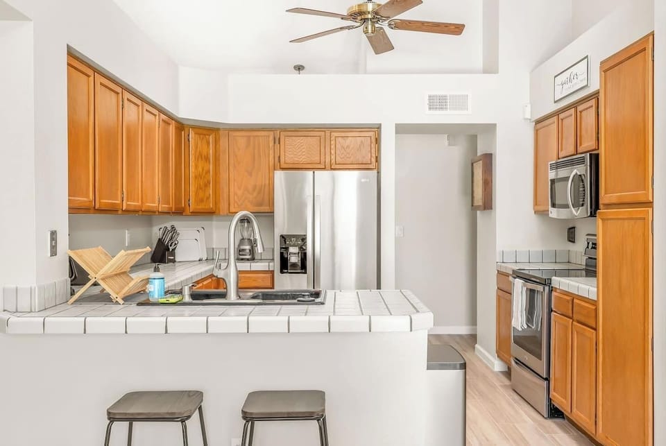 Experience the spacious allure of our kitchen, boasting generous counter and storage space. This well-appointed culinary haven ensures functionality and convenience for your cooking and storage needs.