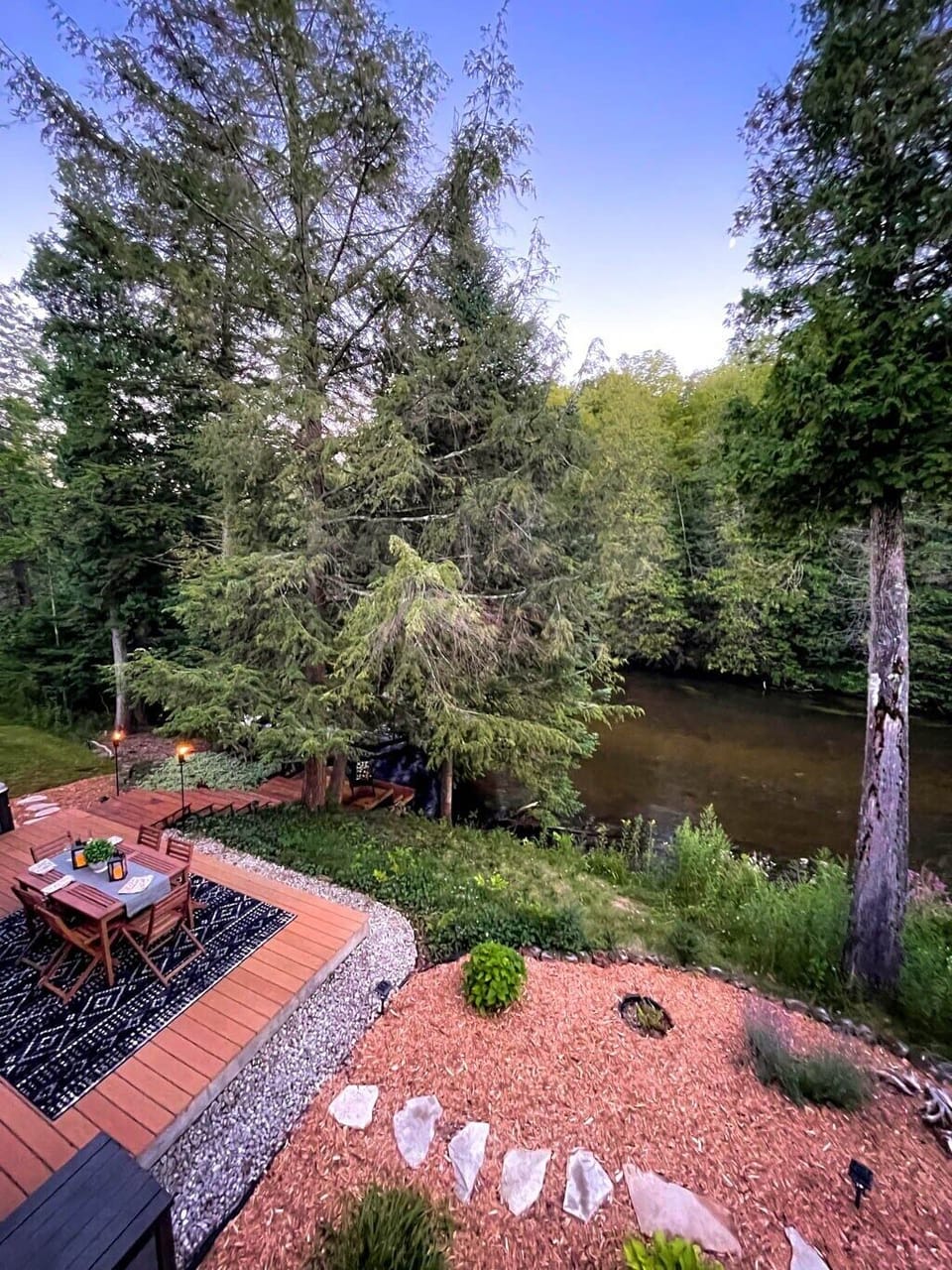 Look how close to the river the house and patio are!