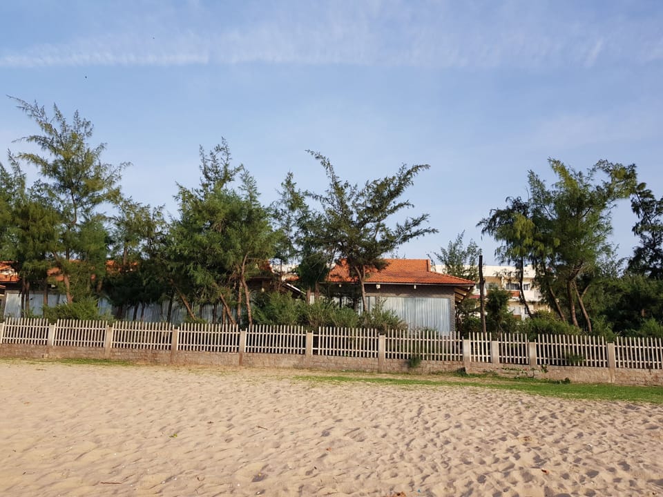 Private beach, white sand, sun loungers, beach umbrellas