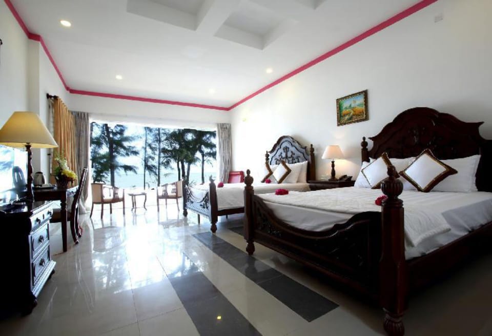 Family Bungalow, Partial Ocean View | Minibar, desk, free WiFi, bed sheets
