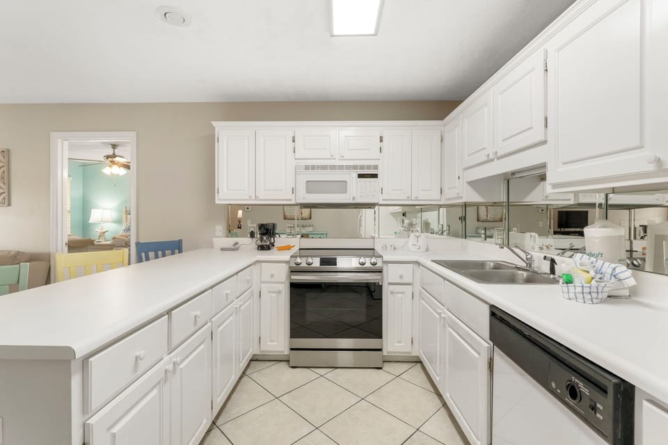 Allows for easy cooking and entertaining. The master bathroom with tub/shower combination.