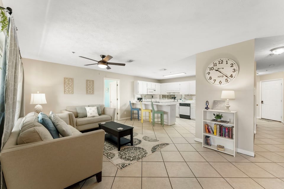 Overall view of the living room and kitchen. The space allows for you and your guests to be together while entertaining.