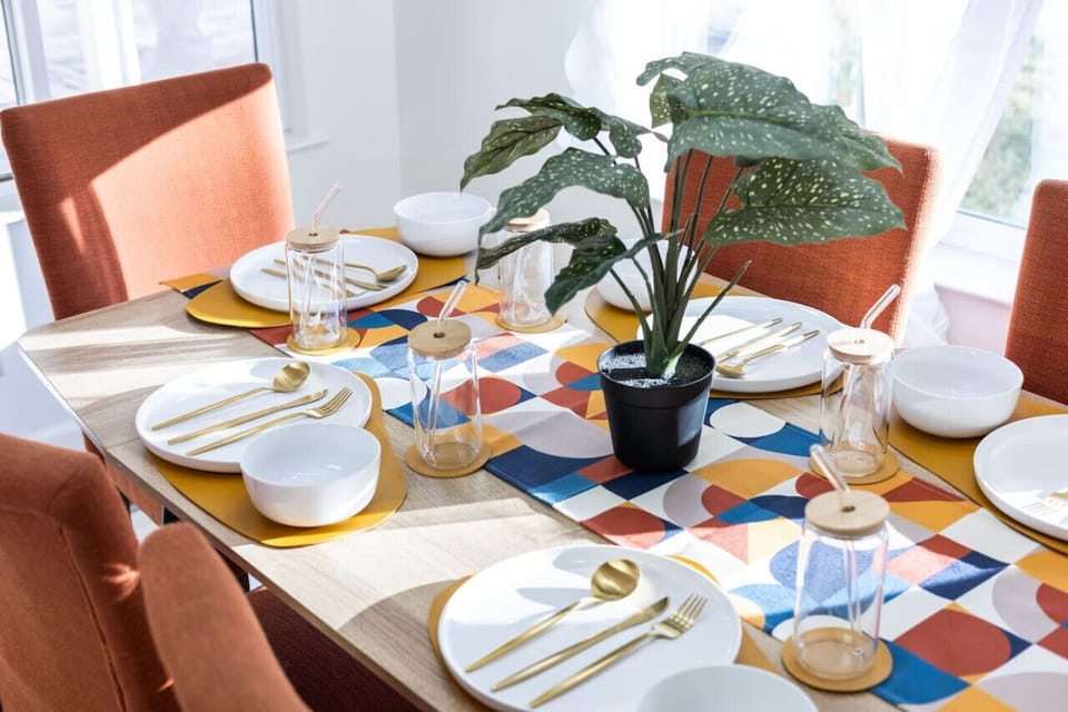 Dining table with modern tableware.