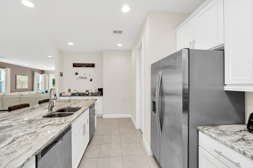 From kitchen to dining to living room, this space flows effortlessly for easy vacation living.