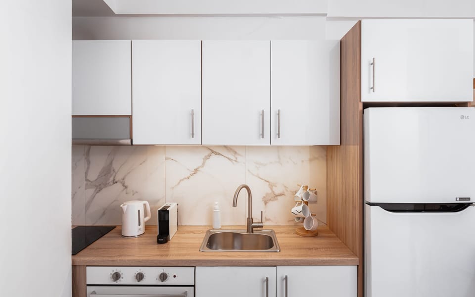 Comfort Apartment, 1 Queen Bed with Sofa bed, Balcony | Private kitchen | Full-size fridge, oven, stovetop, espresso maker