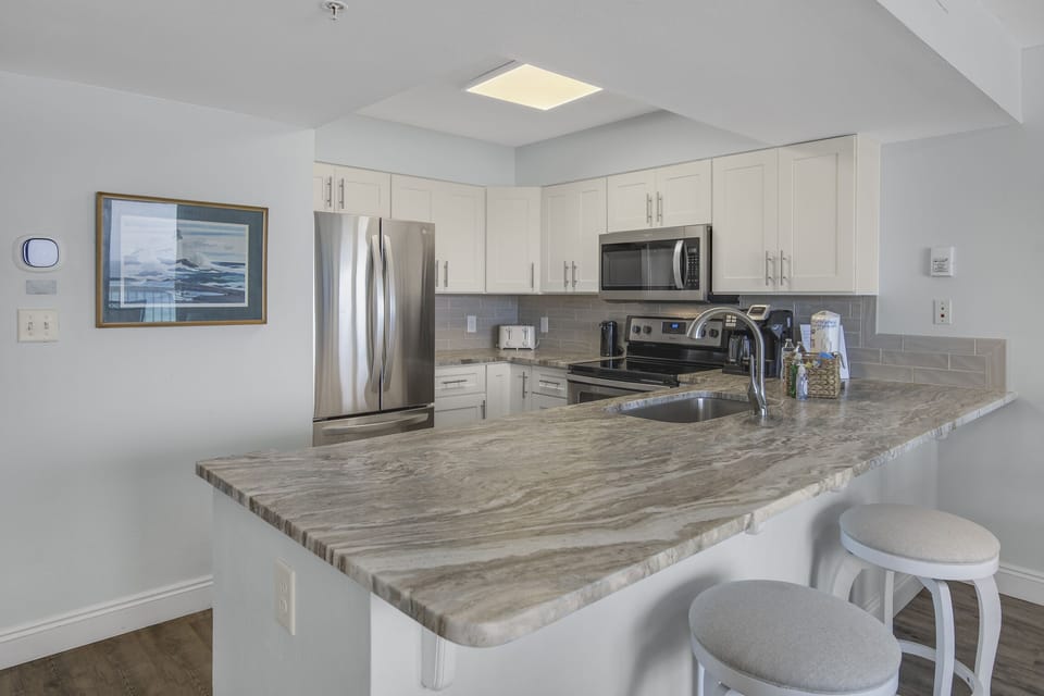 Full kitchen with stainless appliances