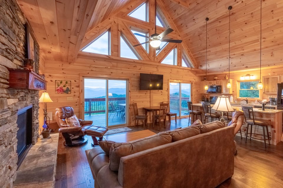 Livingroom - Living room with view of mountains through sliding glass doors and large windows