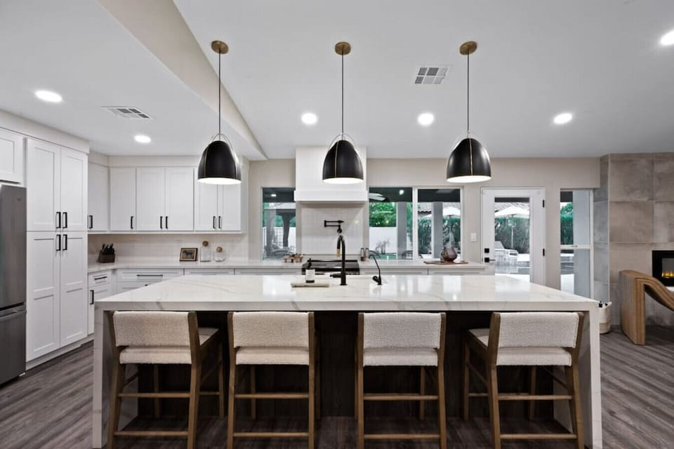 Our kitchen counter and island bar make a perfect spot for casual dining and socializing.