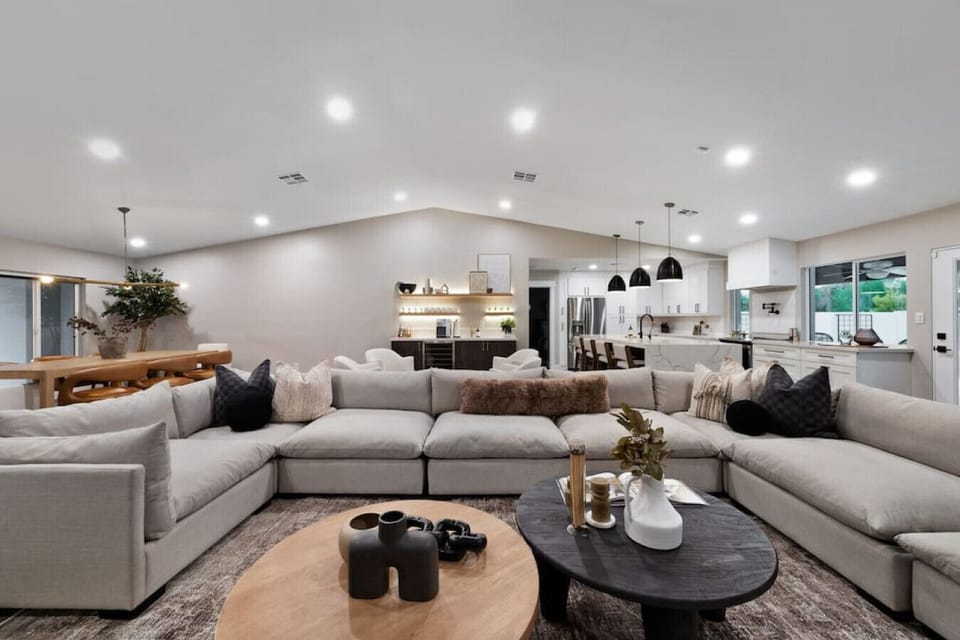Kick back on the roomy L-shaped sofa in this open living space made for relaxing and hanging out.