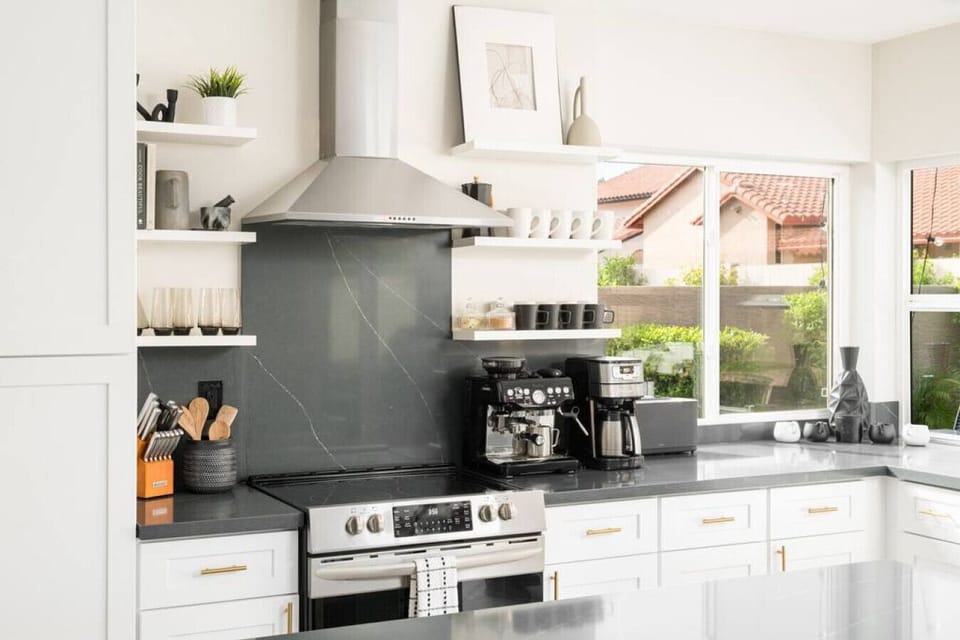 Our stove that has a smoke inhaler to keep our kitchen smoke-free while cooking.