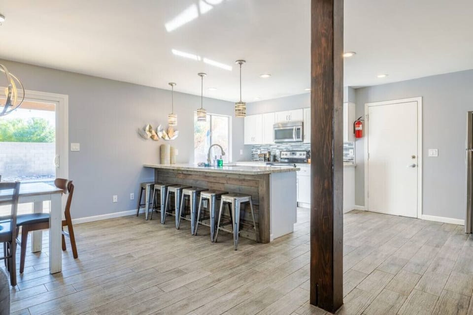 Enjoy meals together in this spacious and inviting dining area.