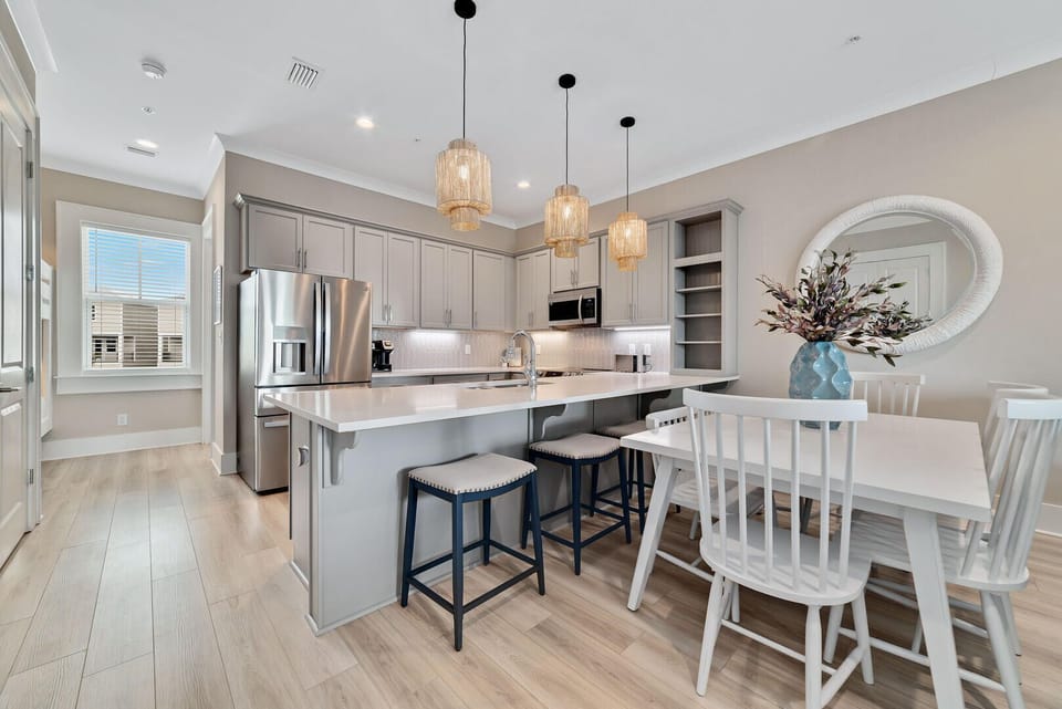 The kitchen seamlessly blends into the dining area, creating a warm and inviting space in the heart of the home.