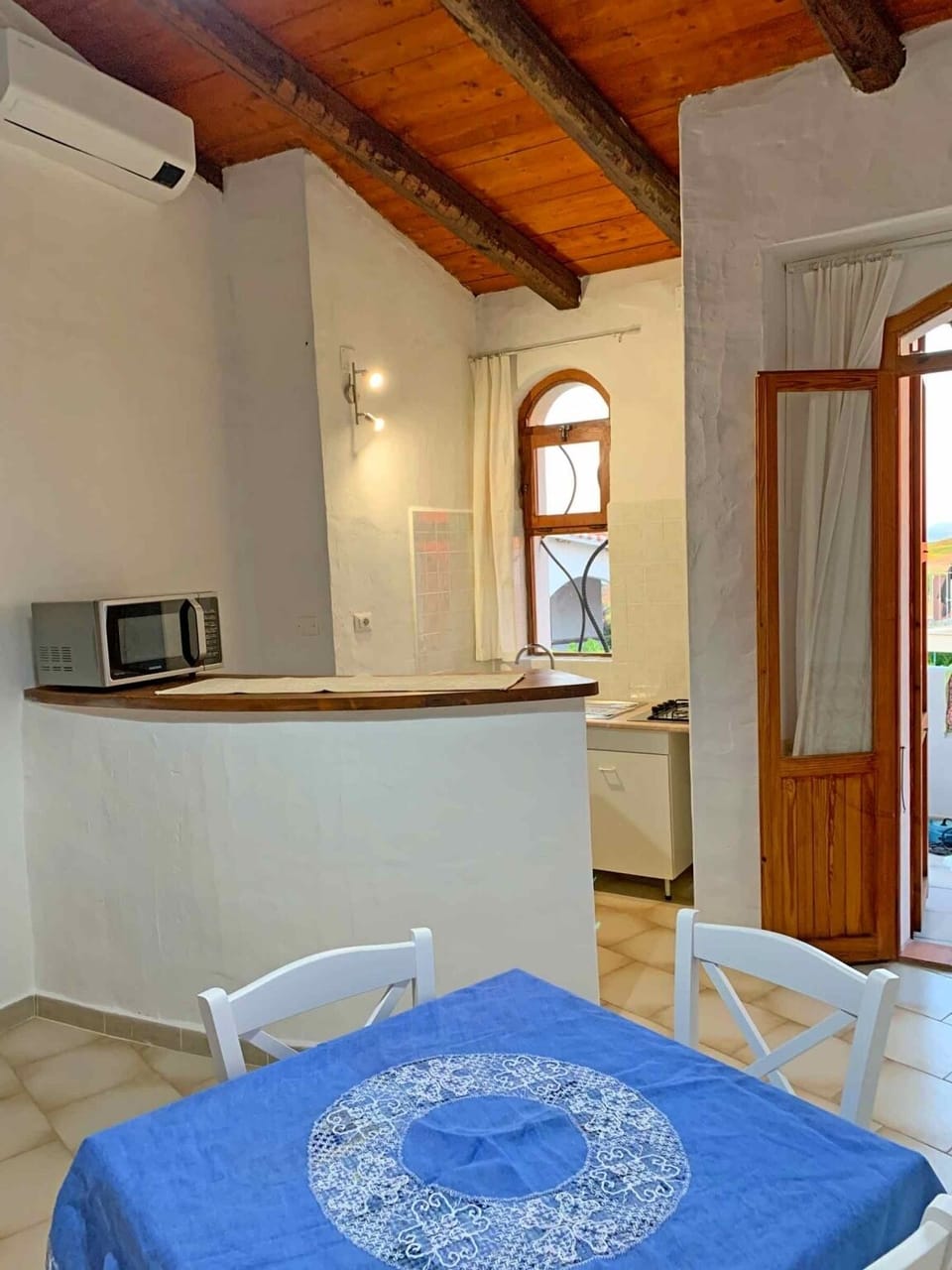 Comfort Apartment | Living area | 32-inch flat-screen TV with cable channels