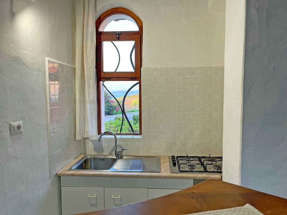 Comfort Apartment | Private kitchen | Full-size fridge, microwave, stovetop, cookware/dishes/utensils